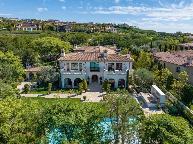 an aerial view of a house with a garden