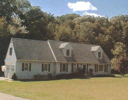 38 Barnum Road Danbury, CT 06811 - Photo 1 of 1 a front view of a house with a yard