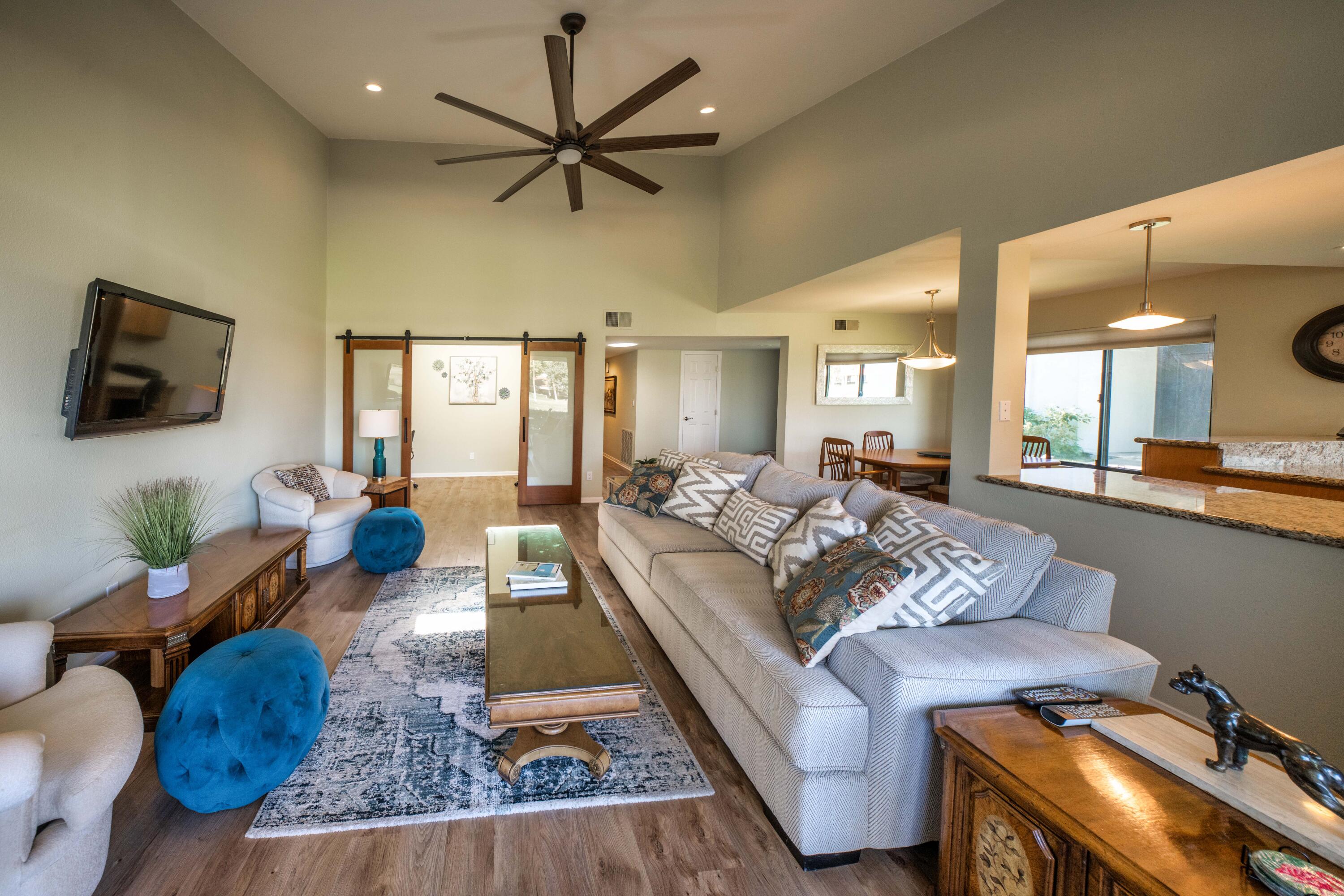 73 Marbella Drive Rancho Mirage, CA 92270 - Photo 11 of 43 a living room with furniture wooden floor and a flat screen tv