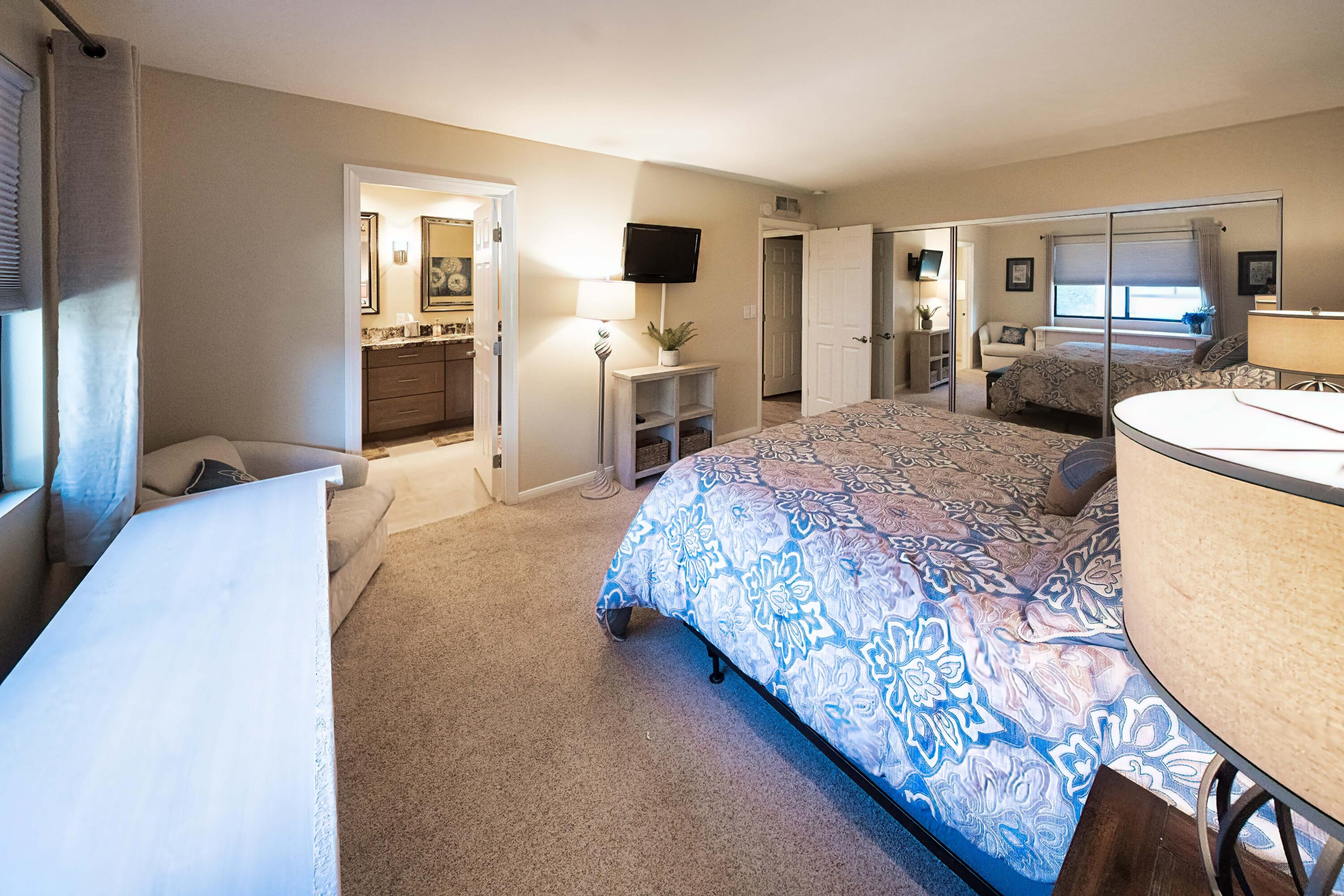 73 Marbella Drive Rancho Mirage, CA 92270 - Photo 15 of 43 a bedroom with a bed and wooden floor