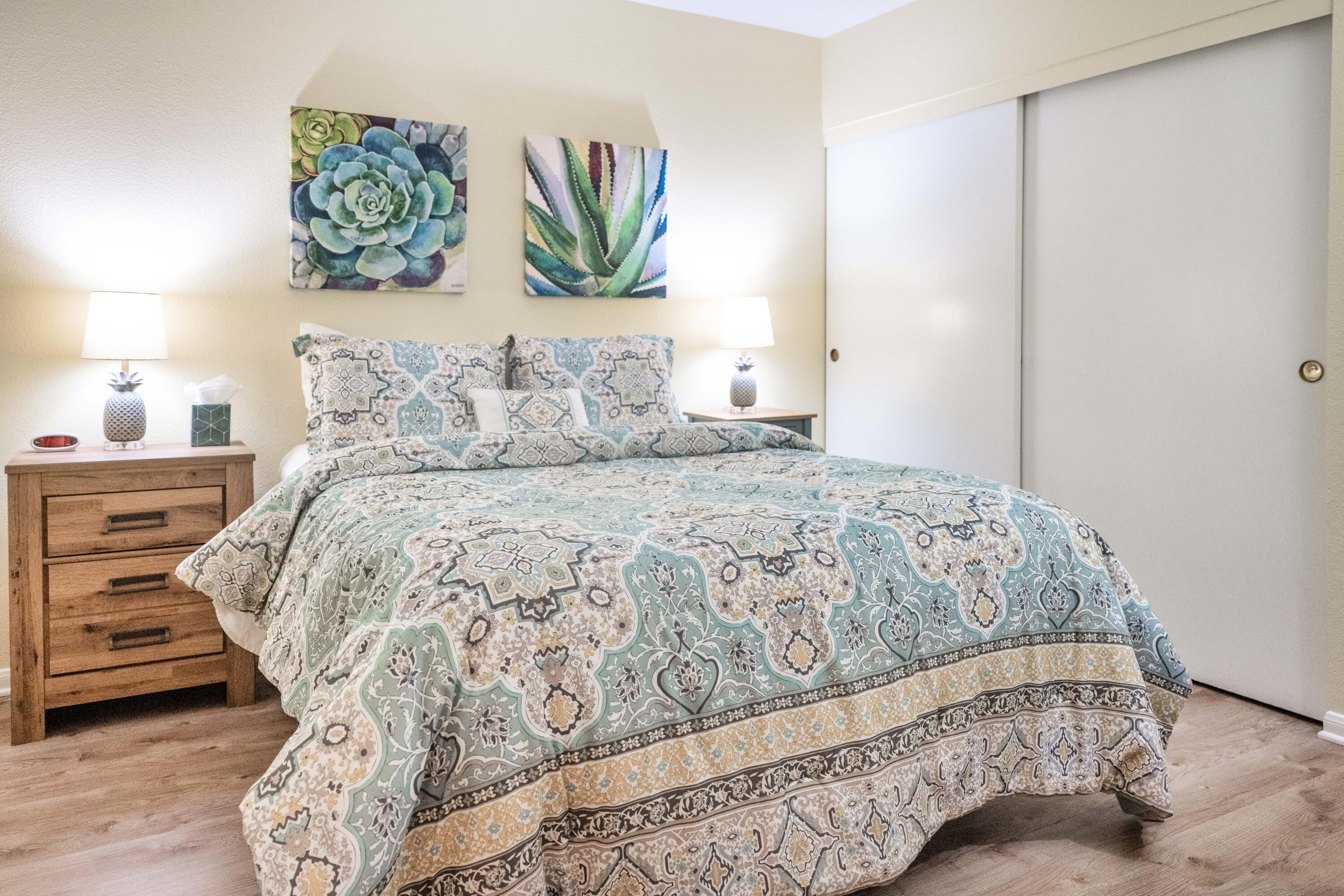 73 Marbella Drive Rancho Mirage, CA 92270 - Photo 20 of 43 a bedroom with a bed and painting on the wall
