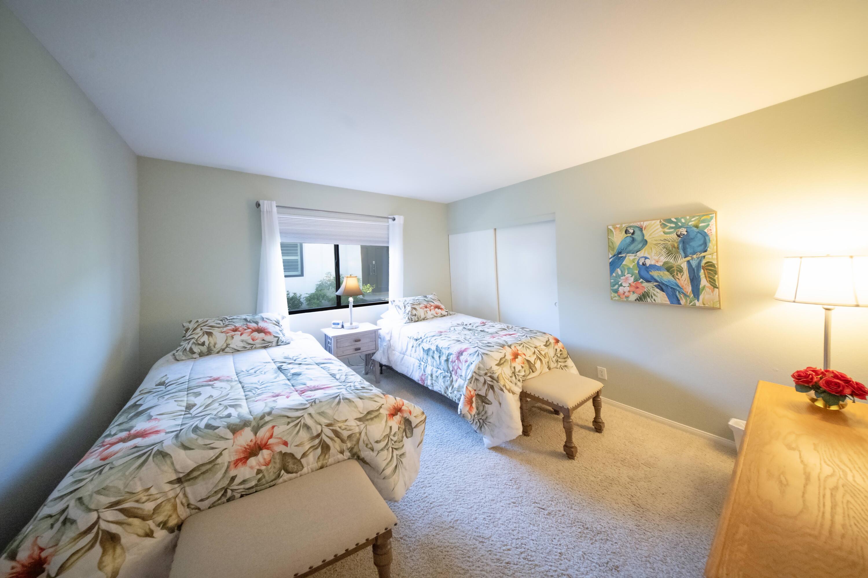 73 Marbella Drive Rancho Mirage, CA 92270 - Photo 22 of 43 a bedroom with a bed and wooden floor