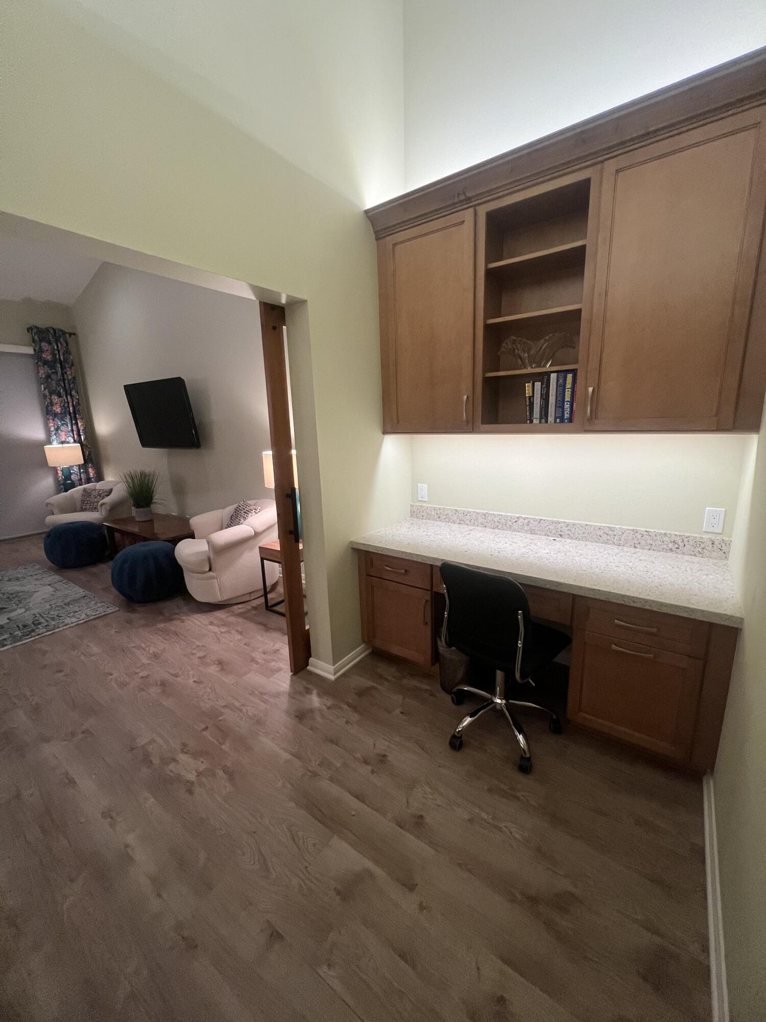 73 Marbella Drive Rancho Mirage, CA 92270 - Photo 23 of 43 a view of a livingroom with workspace and a window