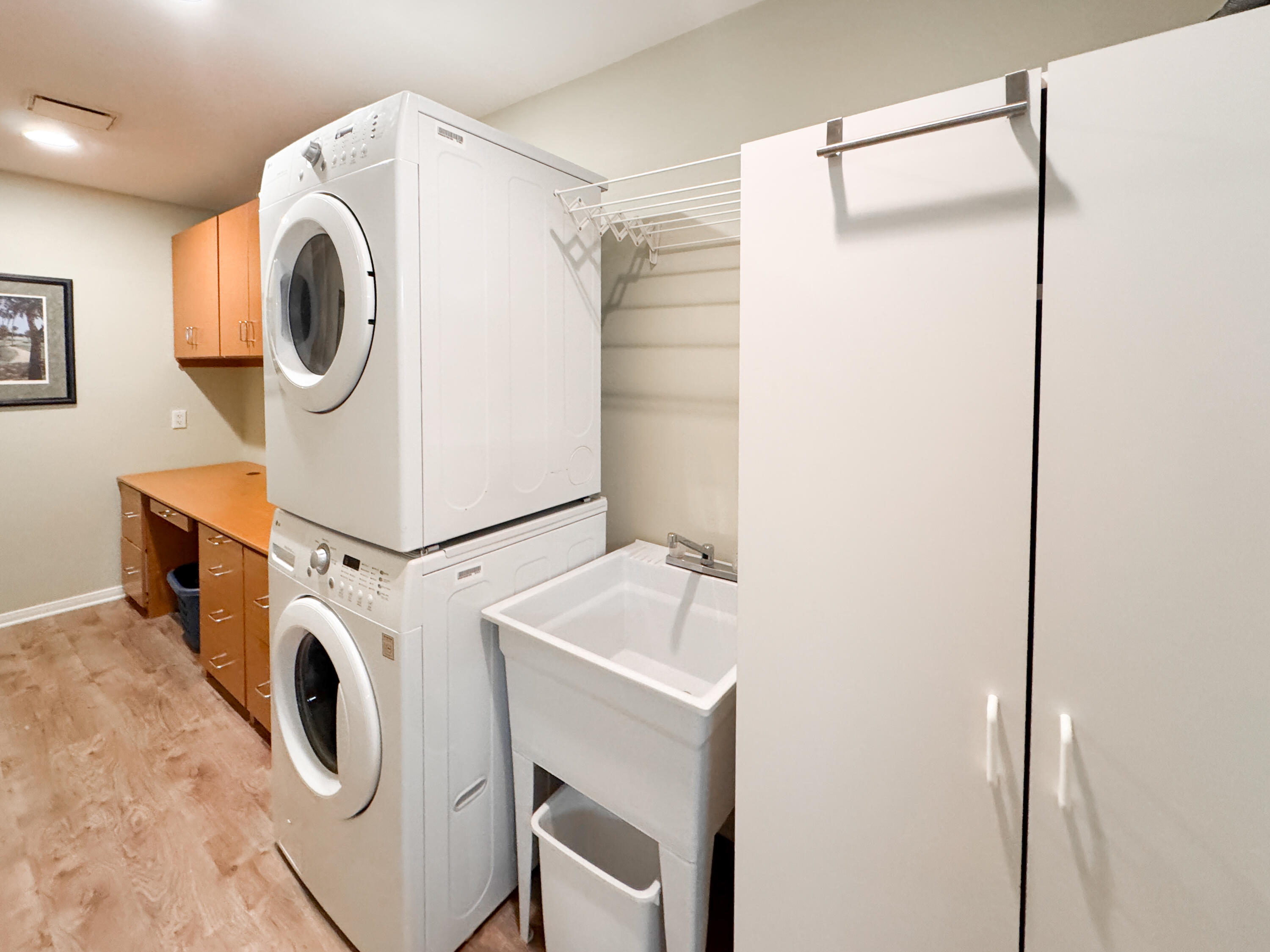 73 Marbella Drive Rancho Mirage, CA 92270 - Photo 26 of 43 a utility room with dryer and washer
