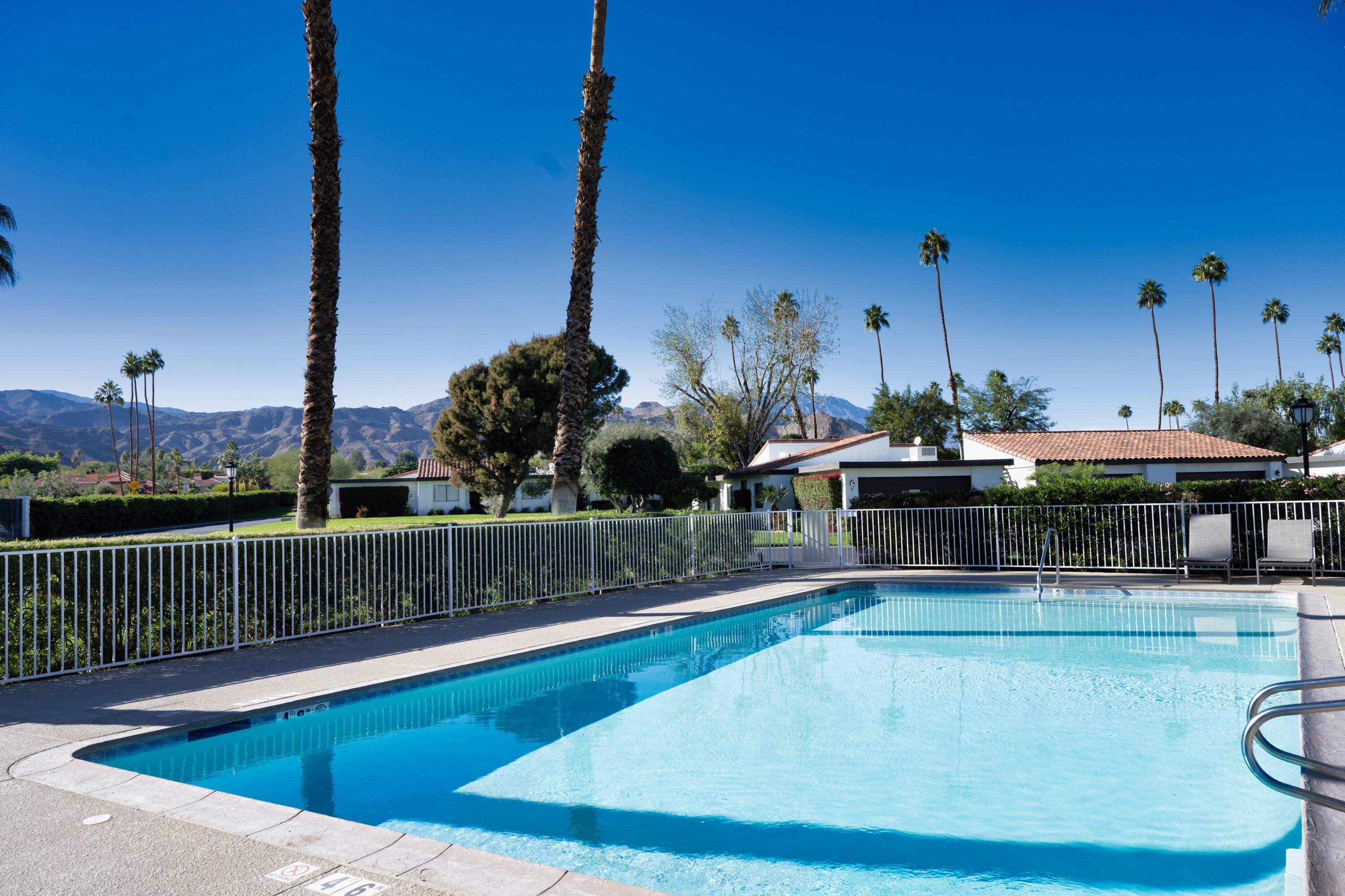 73 Marbella Drive Rancho Mirage, CA 92270 - Photo 29 of 43 a view of a swimming pool with a deck