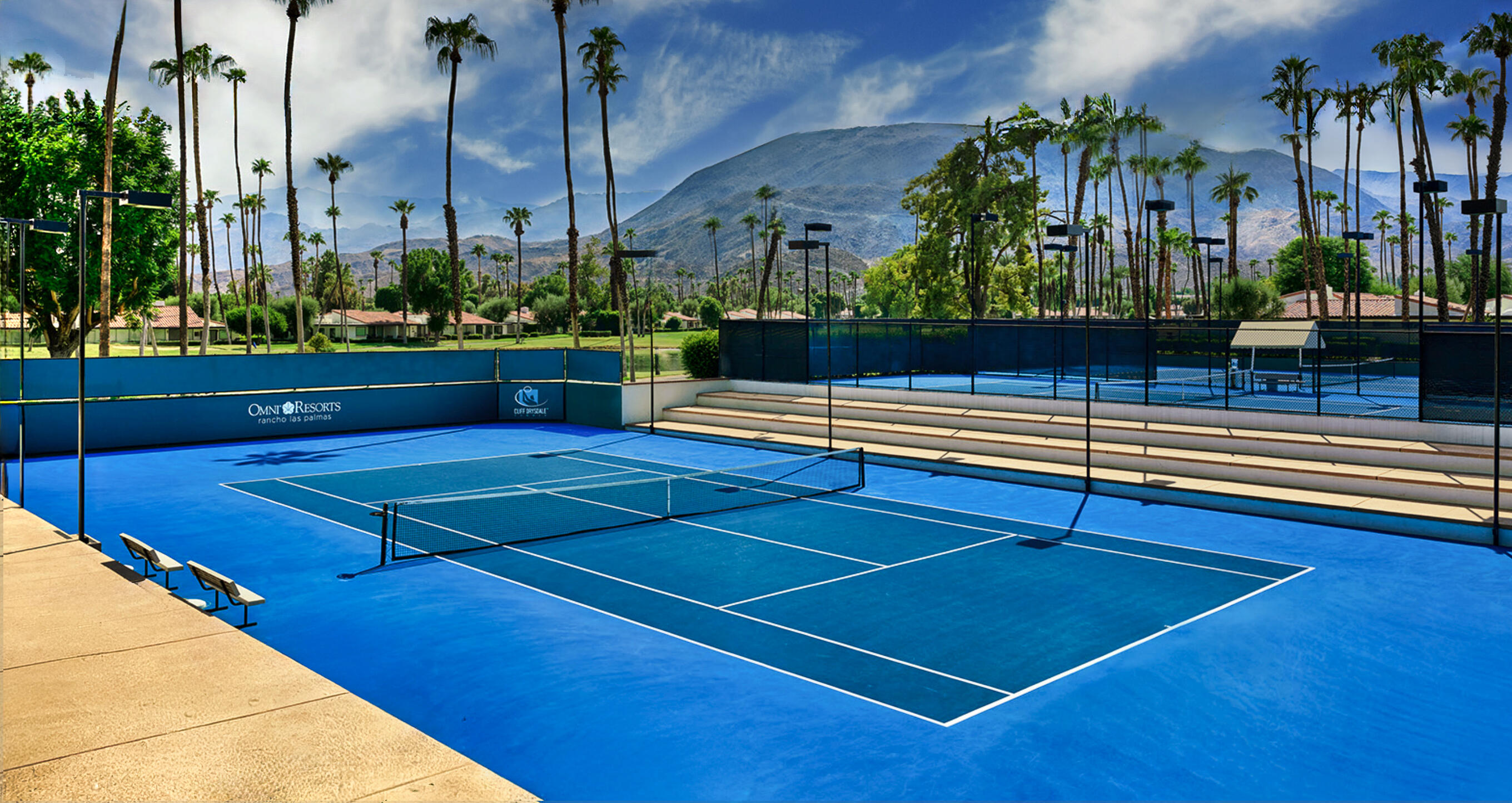 73 Marbella Drive Rancho Mirage, CA 92270 - Photo 35 of 43 a tennis court that has potted plants
