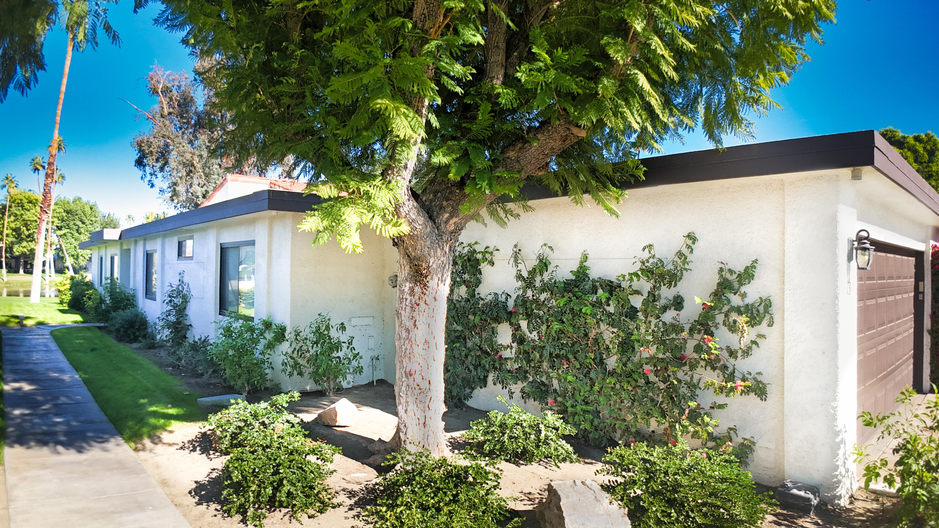 73 Marbella Drive Rancho Mirage, CA 92270 - Photo 41 of 43 a view of a house with a tree