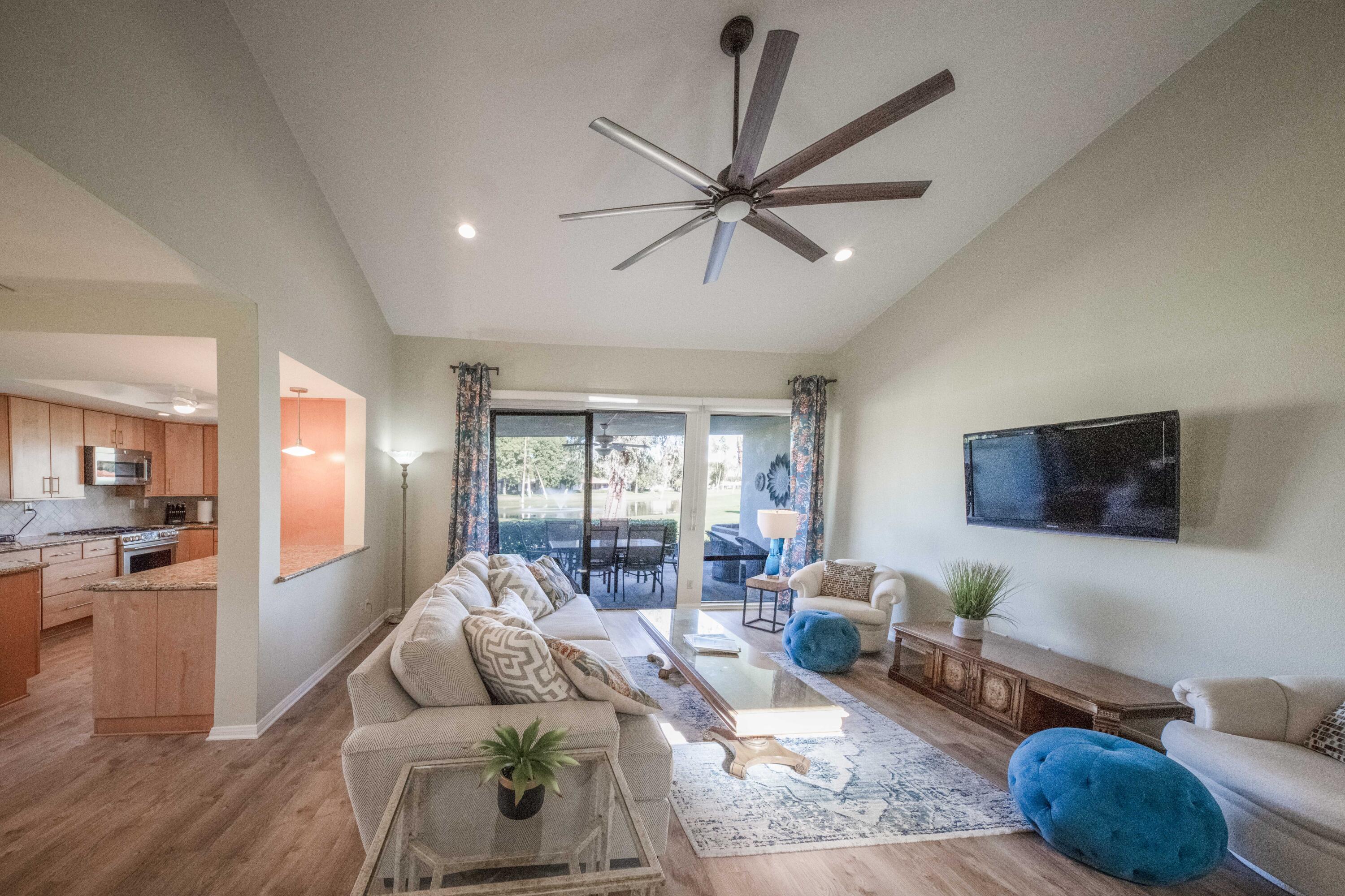 73 Marbella Drive Rancho Mirage, CA 92270 - Photo 8 of 43 a living room with furniture and a flat screen tv