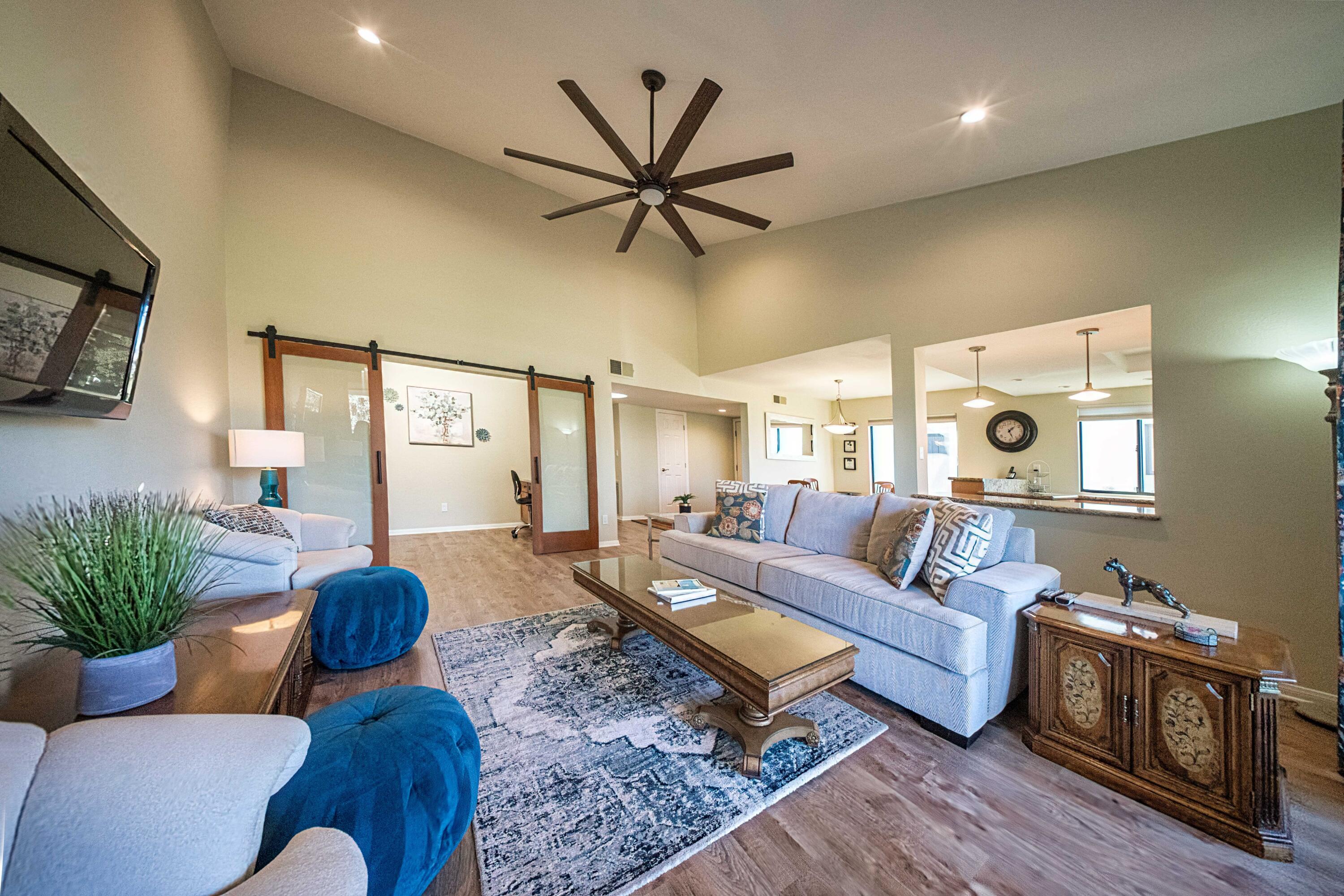 73 Marbella Drive Rancho Mirage, CA 92270 - Photo 9 of 43 a living room with furniture ceiling fan and a rug