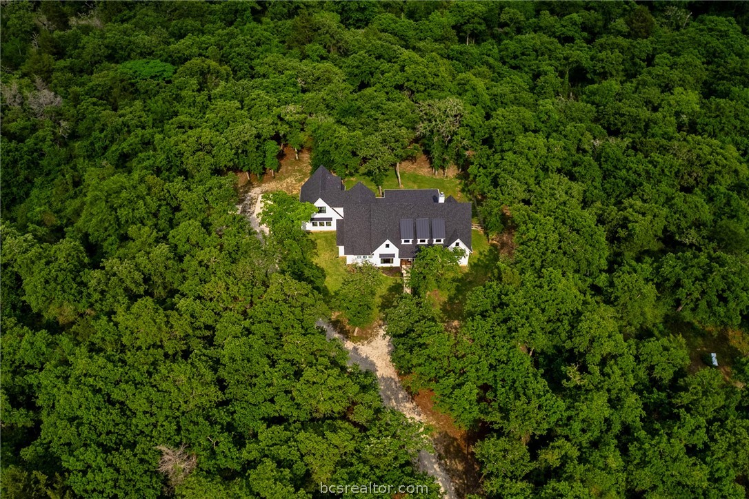 1629 Sawmill Road Franklin, TX 77856 - Photo 2 of 47 an aerial view of a house with a yard
