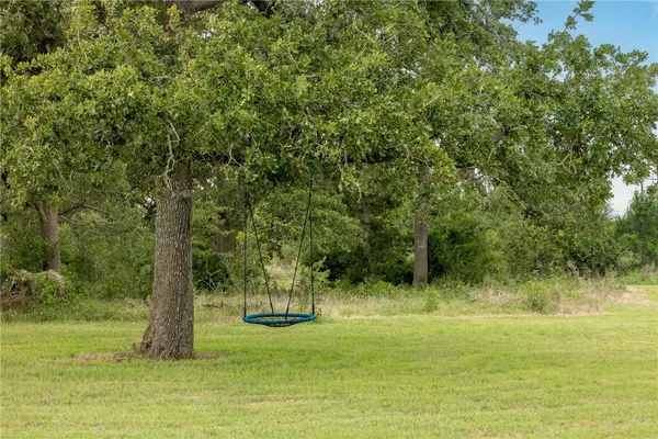 a view of a lake with a big yard