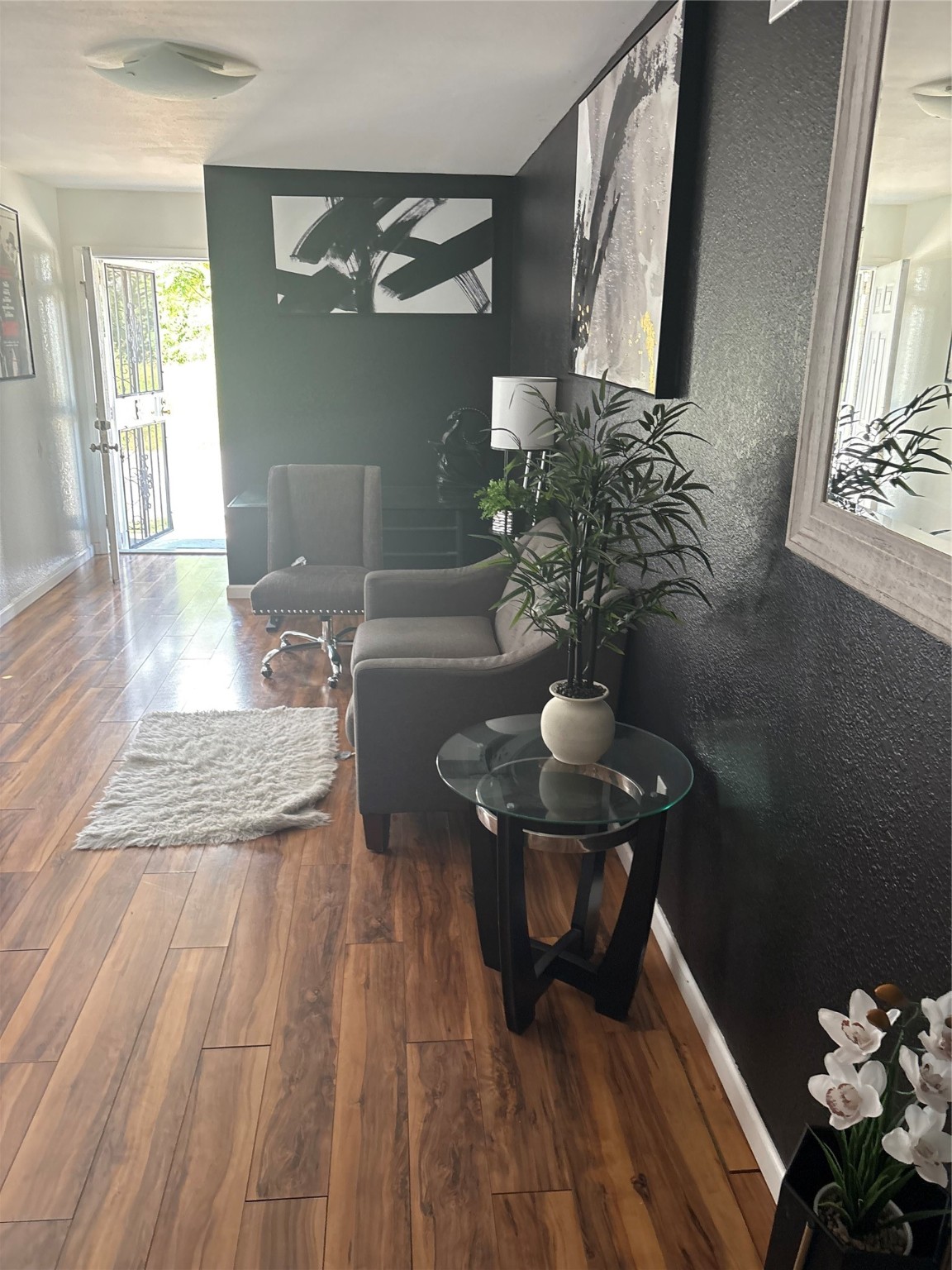 2201 Nettleton Street Houston, TX 77004 - Photo 7 of 21 a view of a dining room with furniture and wooden floor