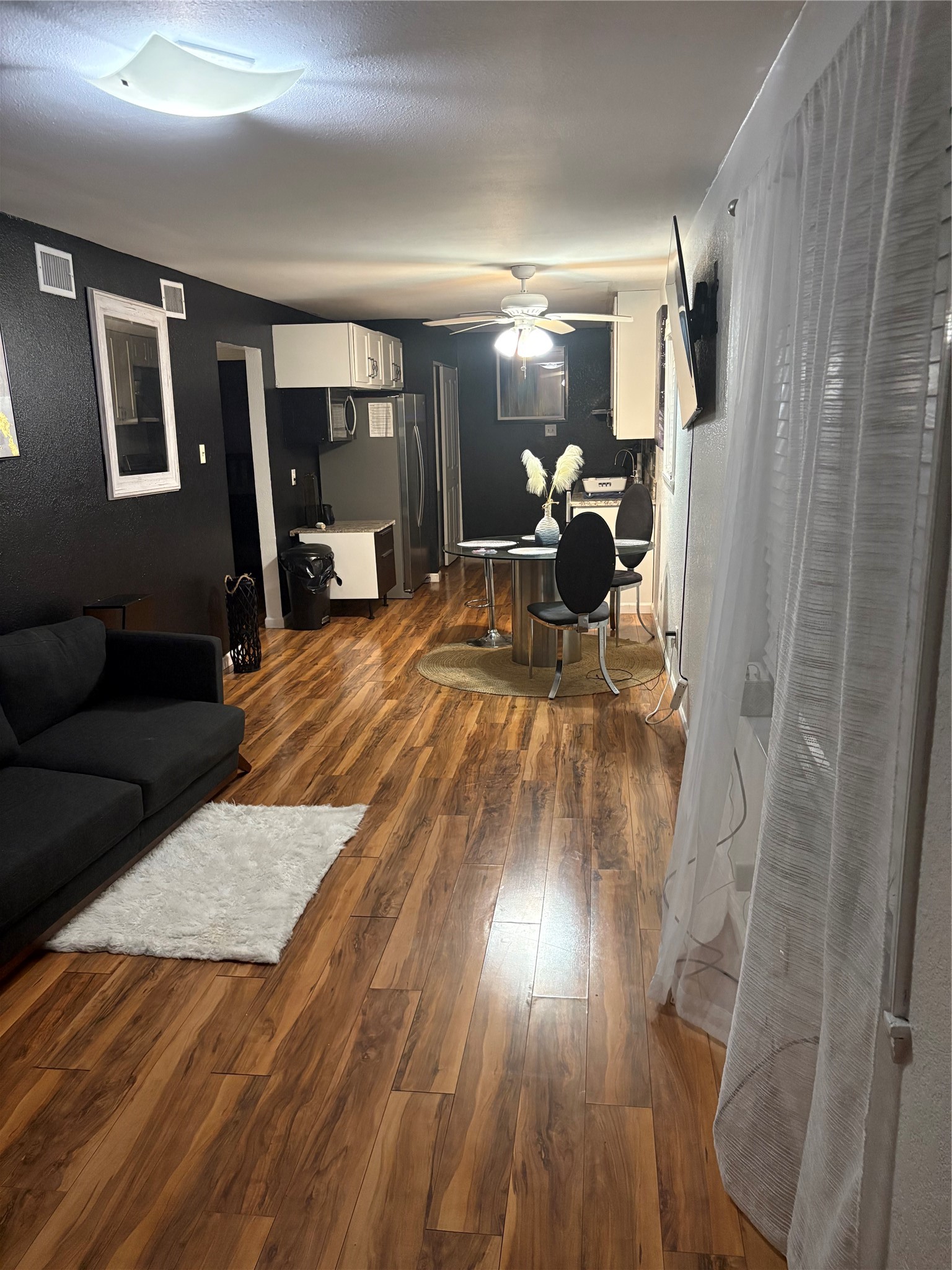 2201 Nettleton Street Houston, TX 77004 - Photo 8 of 21 a bed room with a bed and a mirror