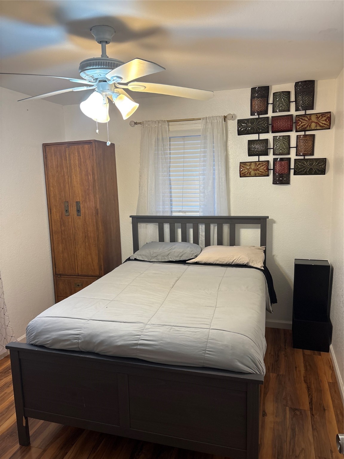 2201 Nettleton Street Houston, TX 77004 - Photo 10 of 21 a bedroom with a bed and a cabinets