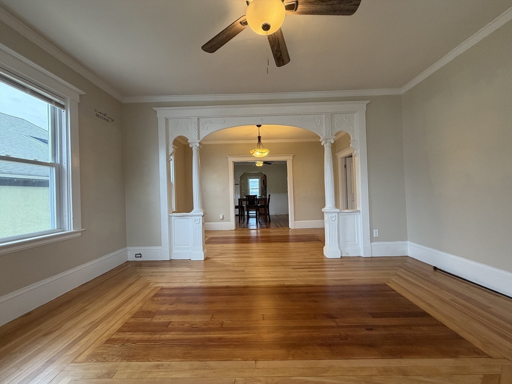 320 Wood Street, Unit 2 New Bedford, MA 02745 - Photo 3 of 23 a view of empty room with wooden floor