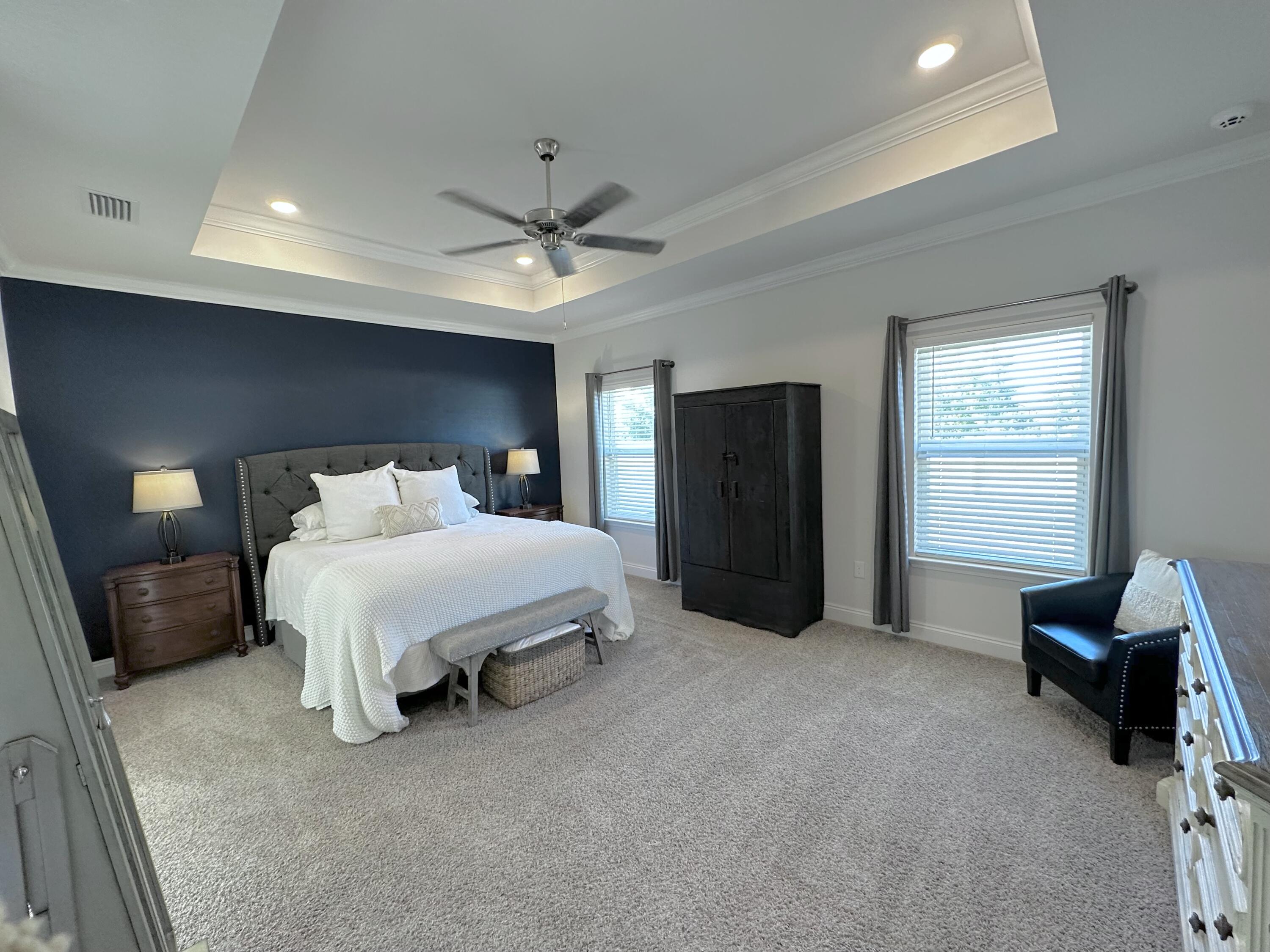 165 Martingale Loop Lynn Haven, FL 32444 - Photo 12 of 37 a bed room with a bed and furniture