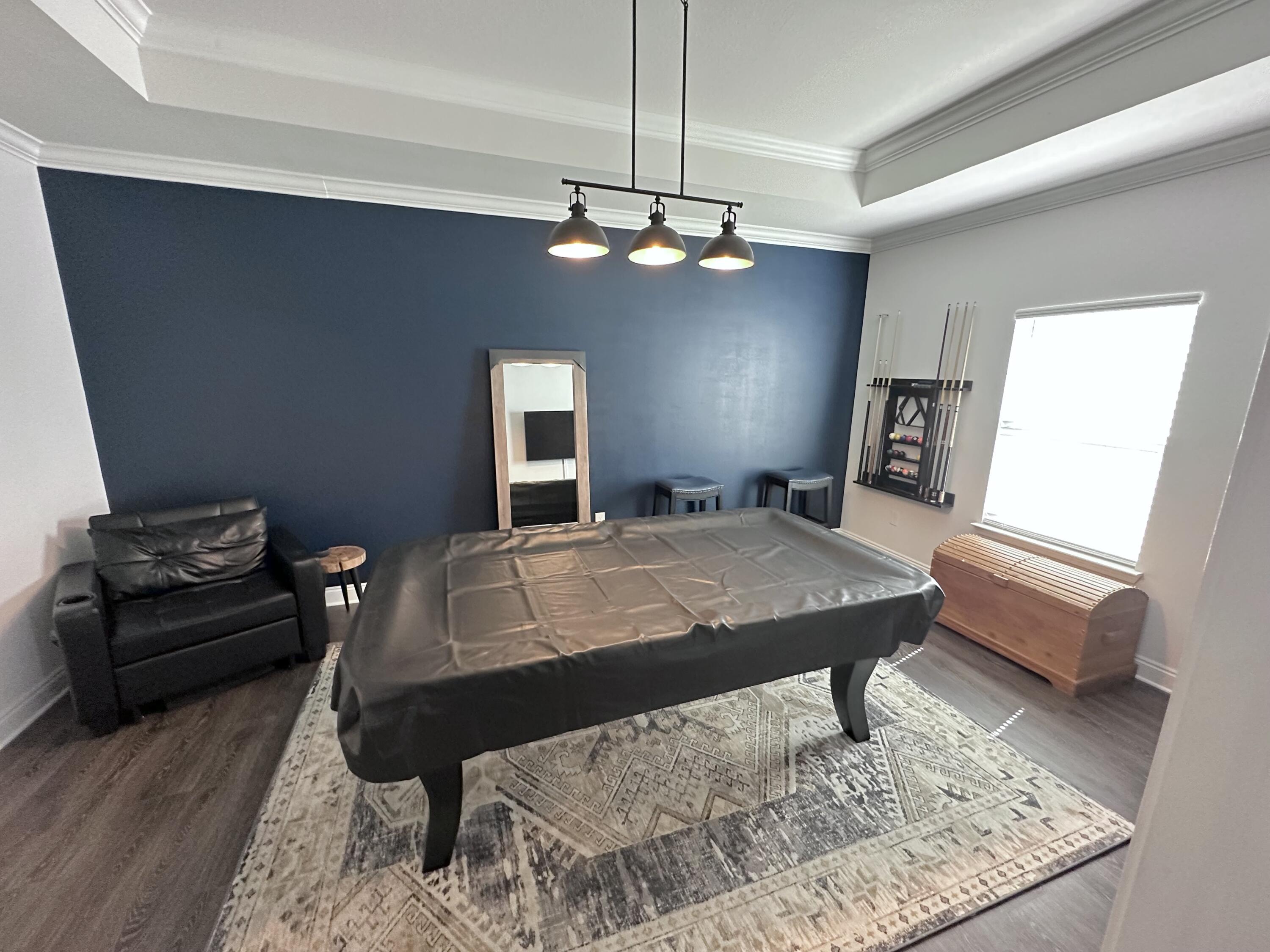 165 Martingale Loop Lynn Haven, FL 32444 - Photo 18 of 37 a bed room with a bed window and a couch