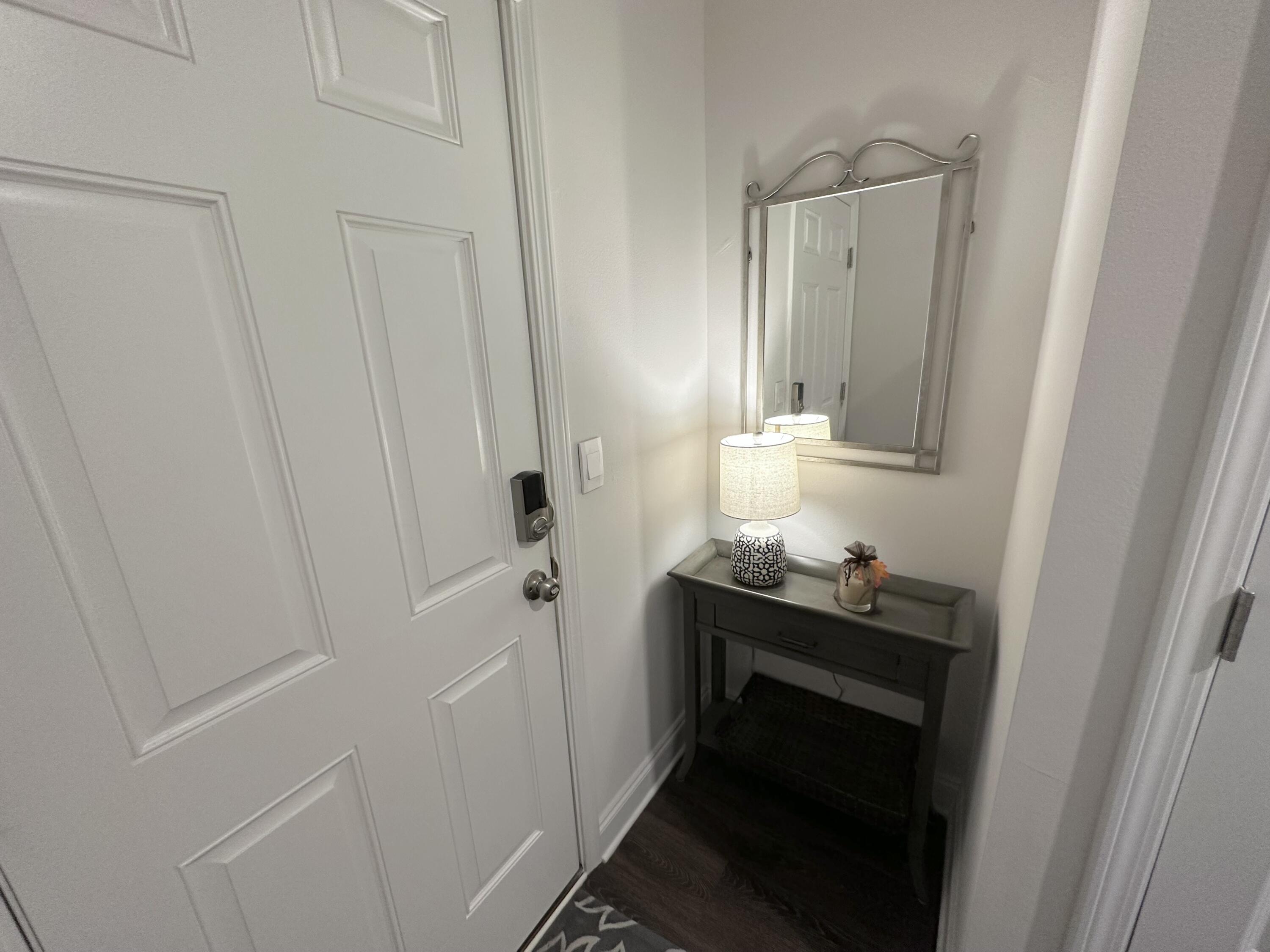 165 Martingale Loop Lynn Haven, FL 32444 - Photo 22 of 37 a bathroom with a sink a toilet and shower