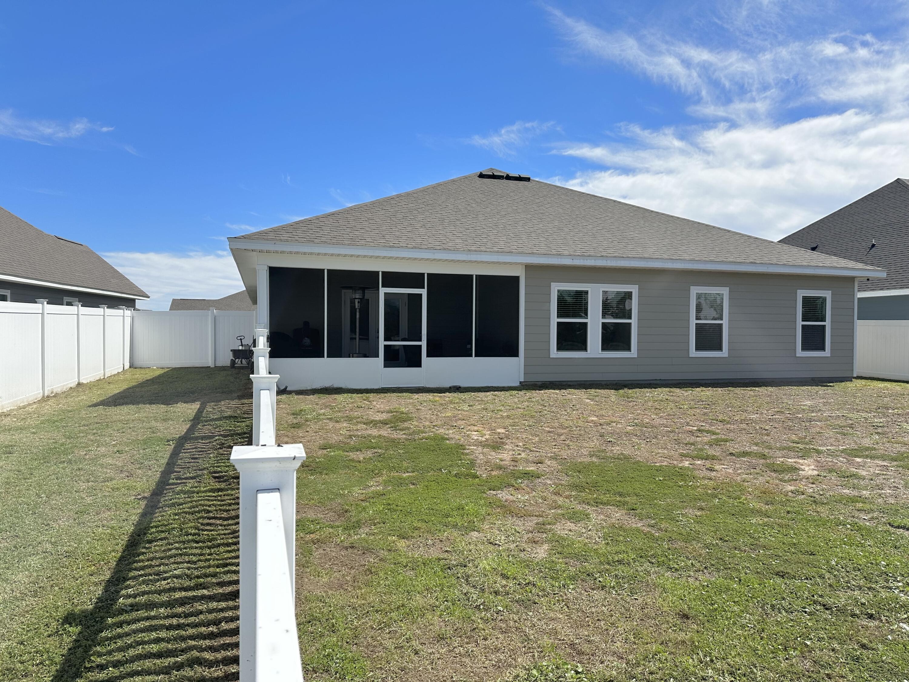 165 Martingale Loop Lynn Haven, FL 32444 - Photo 33 of 37 a front view of a house with a yard