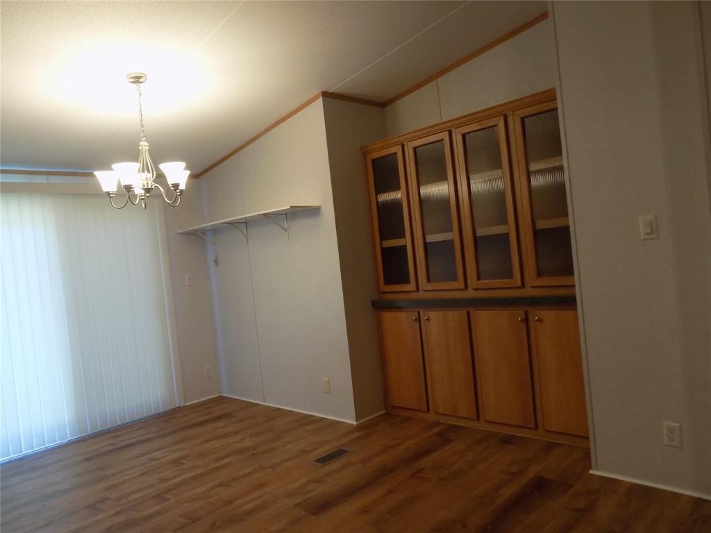 12792 Highway 199 Poolville, TX 76487 - Photo 15 of 24 Built in cabinets in eating area