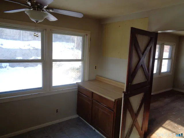 a room that has a bed and a window