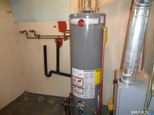 a bathroom with a bathtub and shower