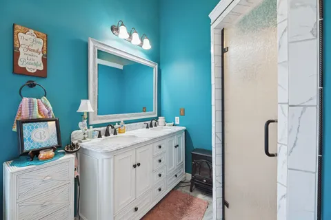 a utility room with a sink dryer and washer