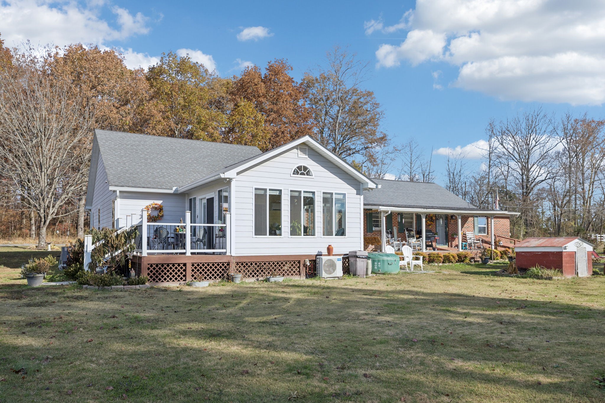 3280 Bethel Road Smithville, TN 37166 - Photo 29 of 35 a front view of a house with a yard table and chairs