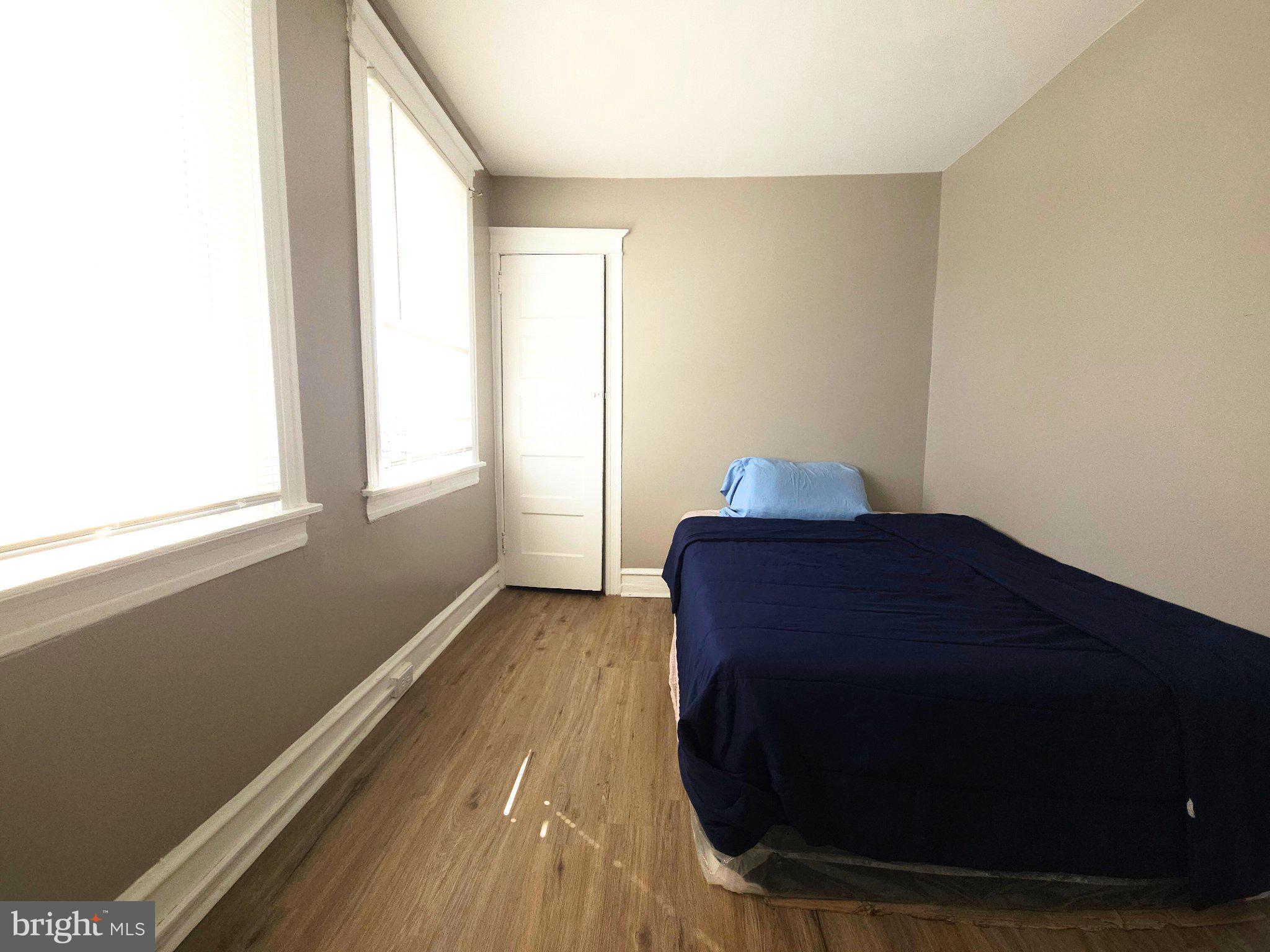 411 South Maple Avenue Lansdowne, PA 19050 - Photo 15 of 18 a room with a bed and a window