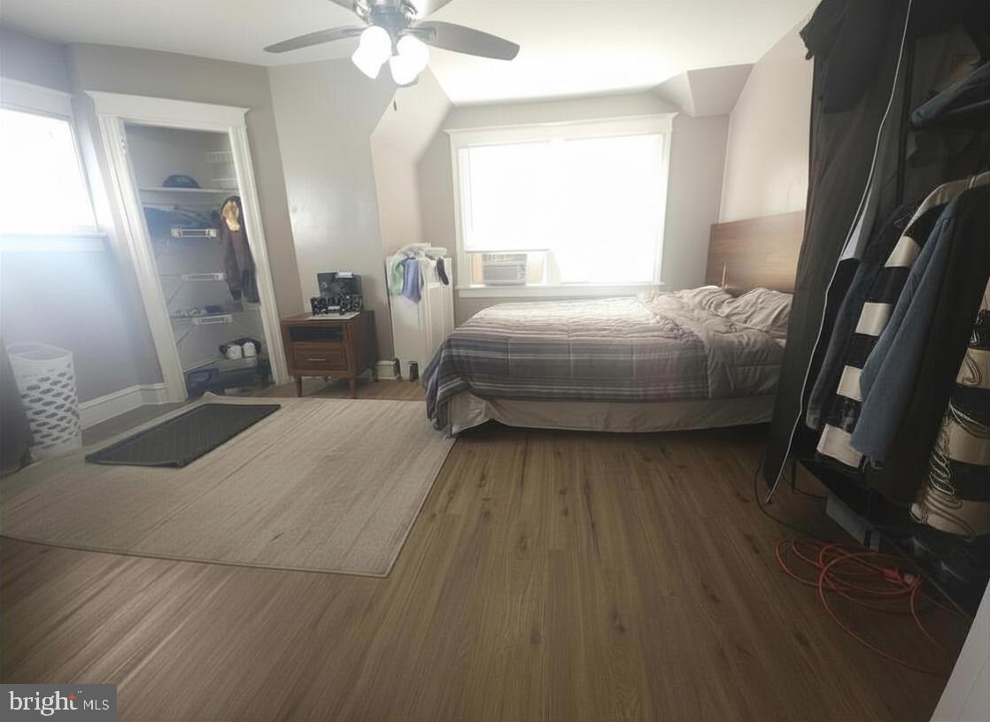 411 South Maple Avenue Lansdowne, PA 19050 - Photo 16 of 18 a bedroom with a bed and a mirror