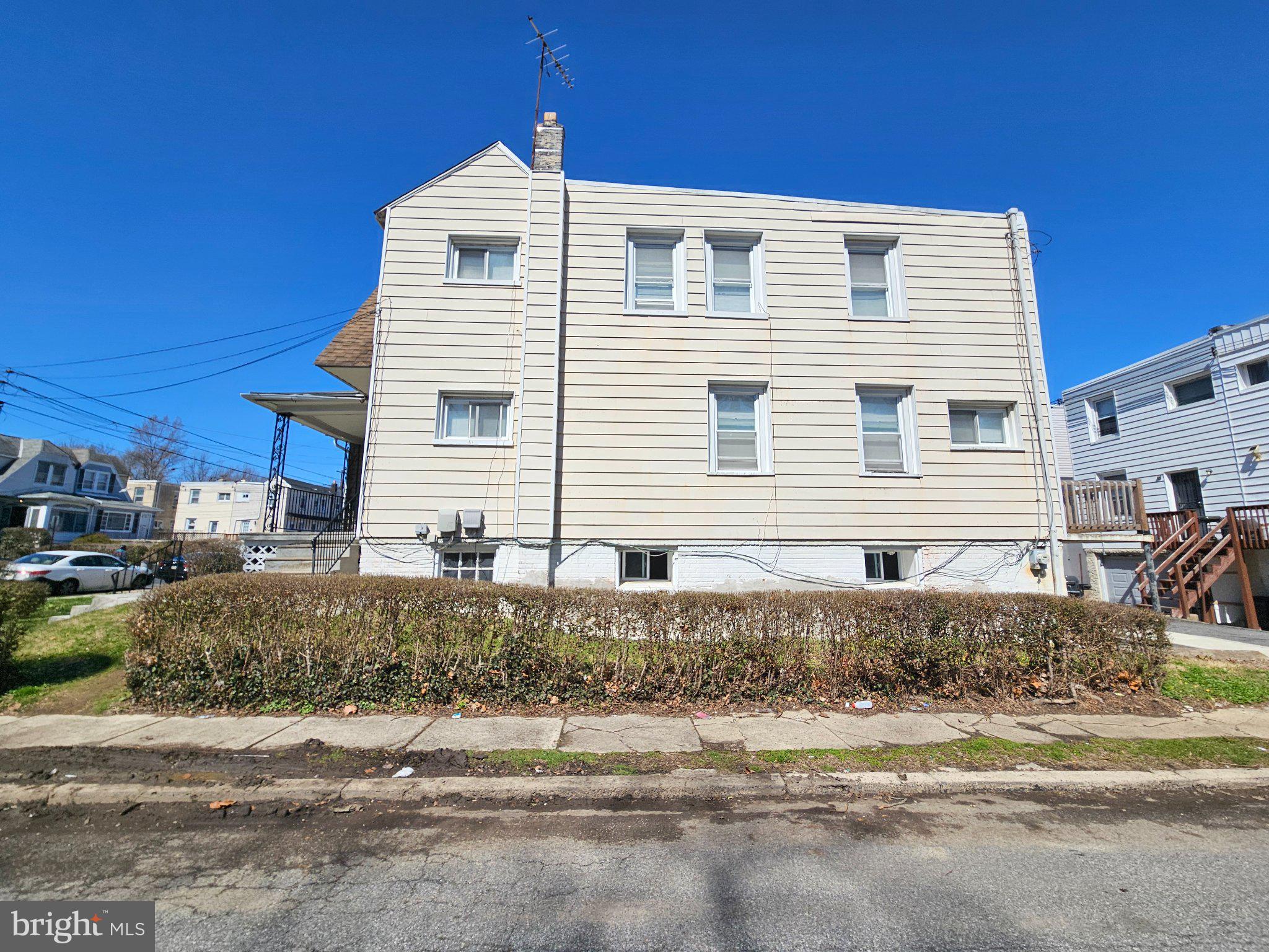 411 South Maple Avenue Lansdowne, PA 19050 - Photo 3 of 18 a front view of a house with a yard