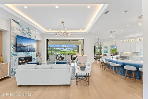 a large kitchen with a table and chairs