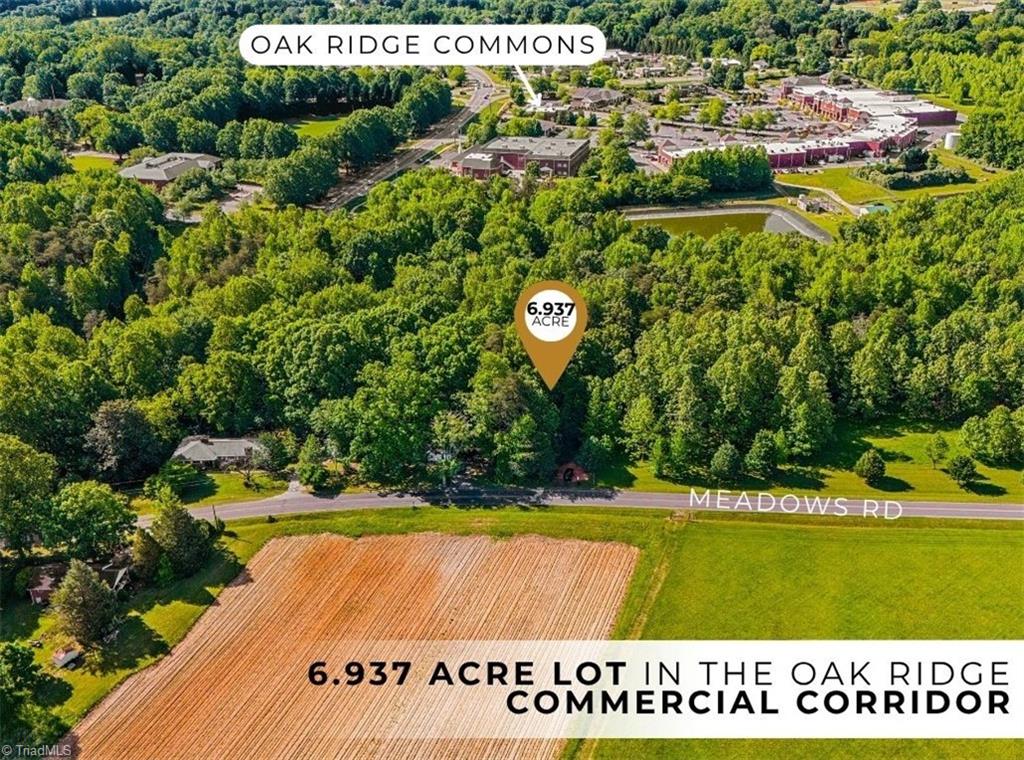 8305 Meadows Road, Unit 6 937 ACRES Oak Ridge, NC 27310 - Photo 3 of 4 Unrivaled proximity to the heart of Oak Ridge commerce. Located directly adjacent to Oak Ridge Commons, your future development will benefit from the established foot traffic of major grocery, dining, and retail hubs.