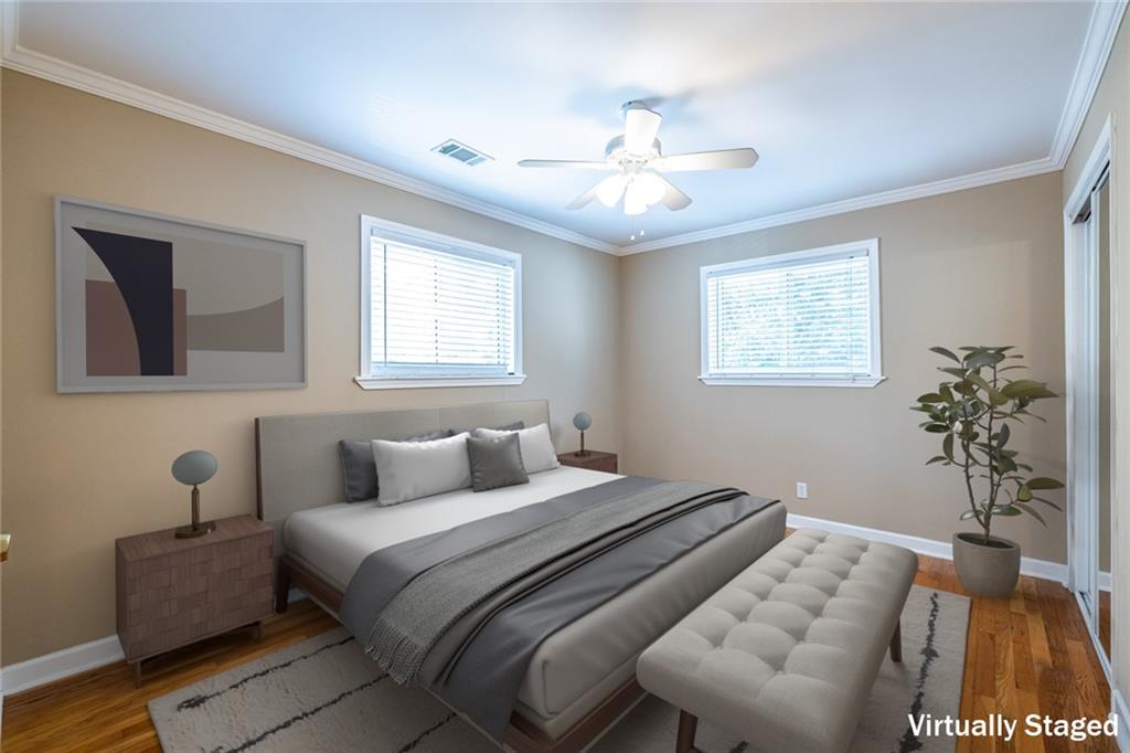 263 Jefferson Place, Unit 31 Decatur, GA 30030 - Photo 11 of 27 a bedroom with furniture and a window