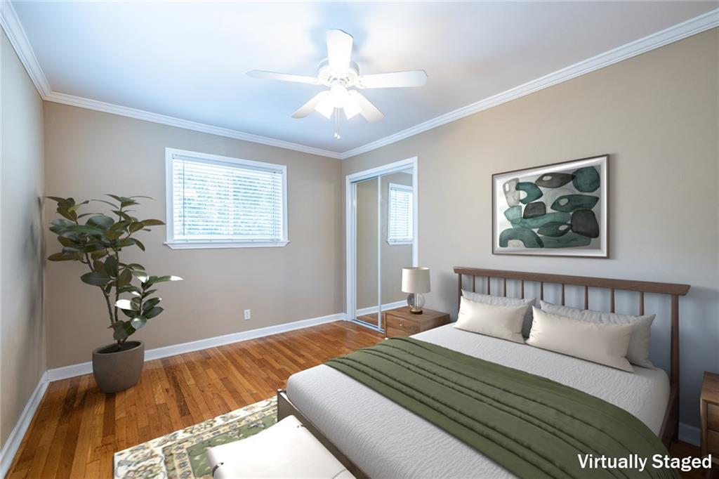 263 Jefferson Place, Unit 31 Decatur, GA 30030 - Photo 14 of 27 a bedroom with bed and a window