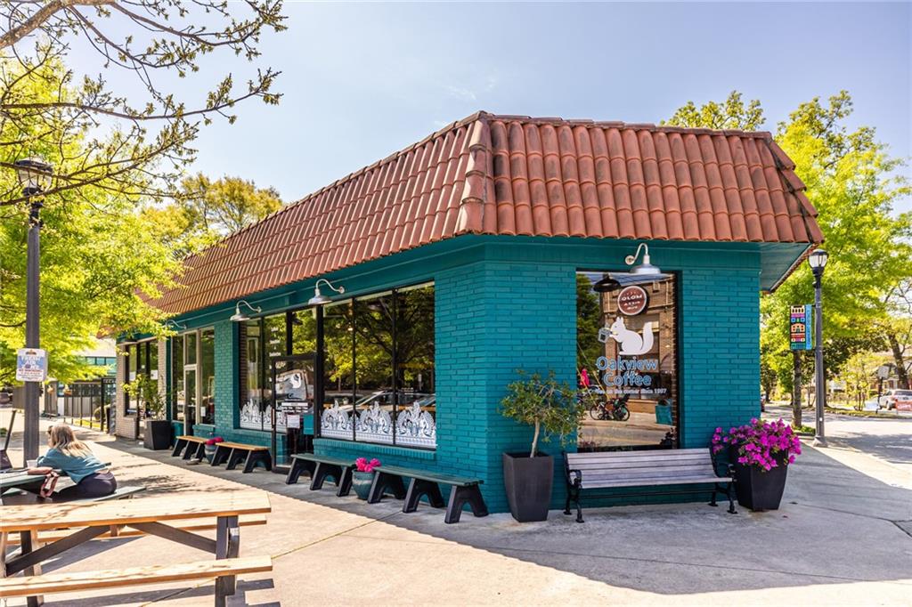 263 Jefferson Place, Unit 31 Decatur, GA 30030 - Photo 21 of 27 a front view of a house with a garden