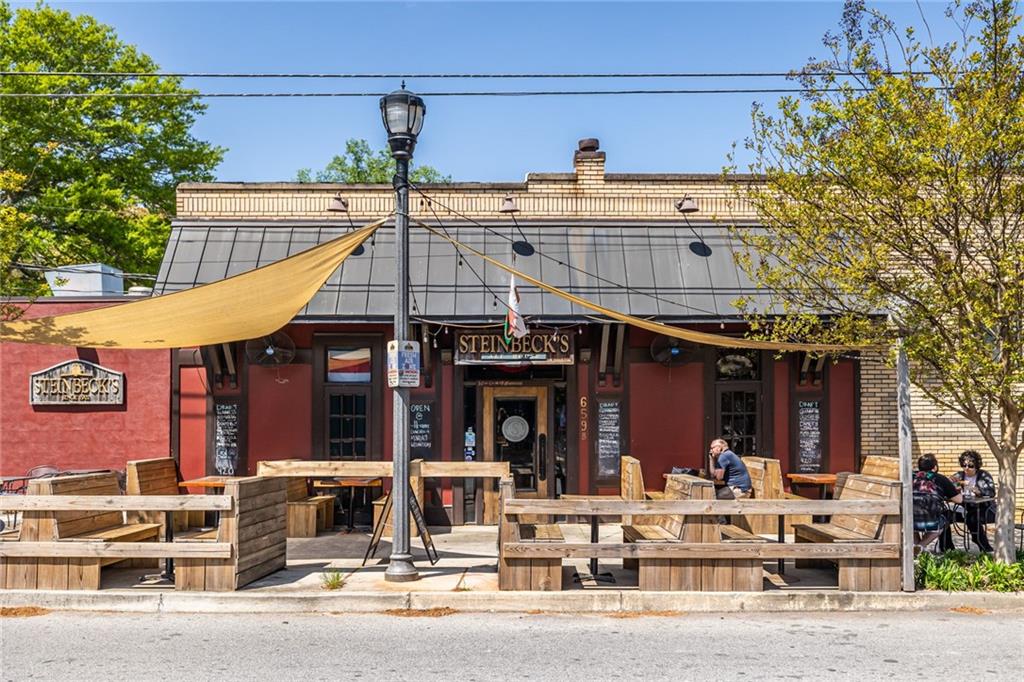 263 Jefferson Place, Unit 31 Decatur, GA 30030 - Photo 22 of 27 a view of a cafe with sitting area