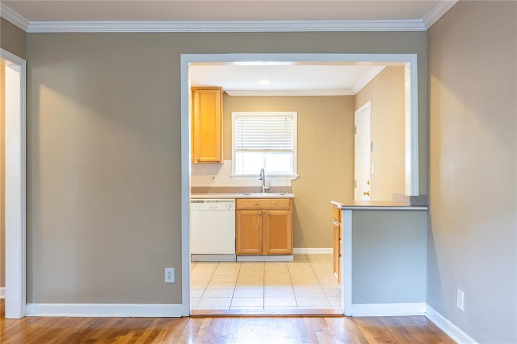 263 Jefferson Place, Unit 31 Decatur, GA 30030 - Photo 9 of 27 a view of a kitchen with a sink and a window