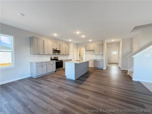 a large kitchen with cabinets