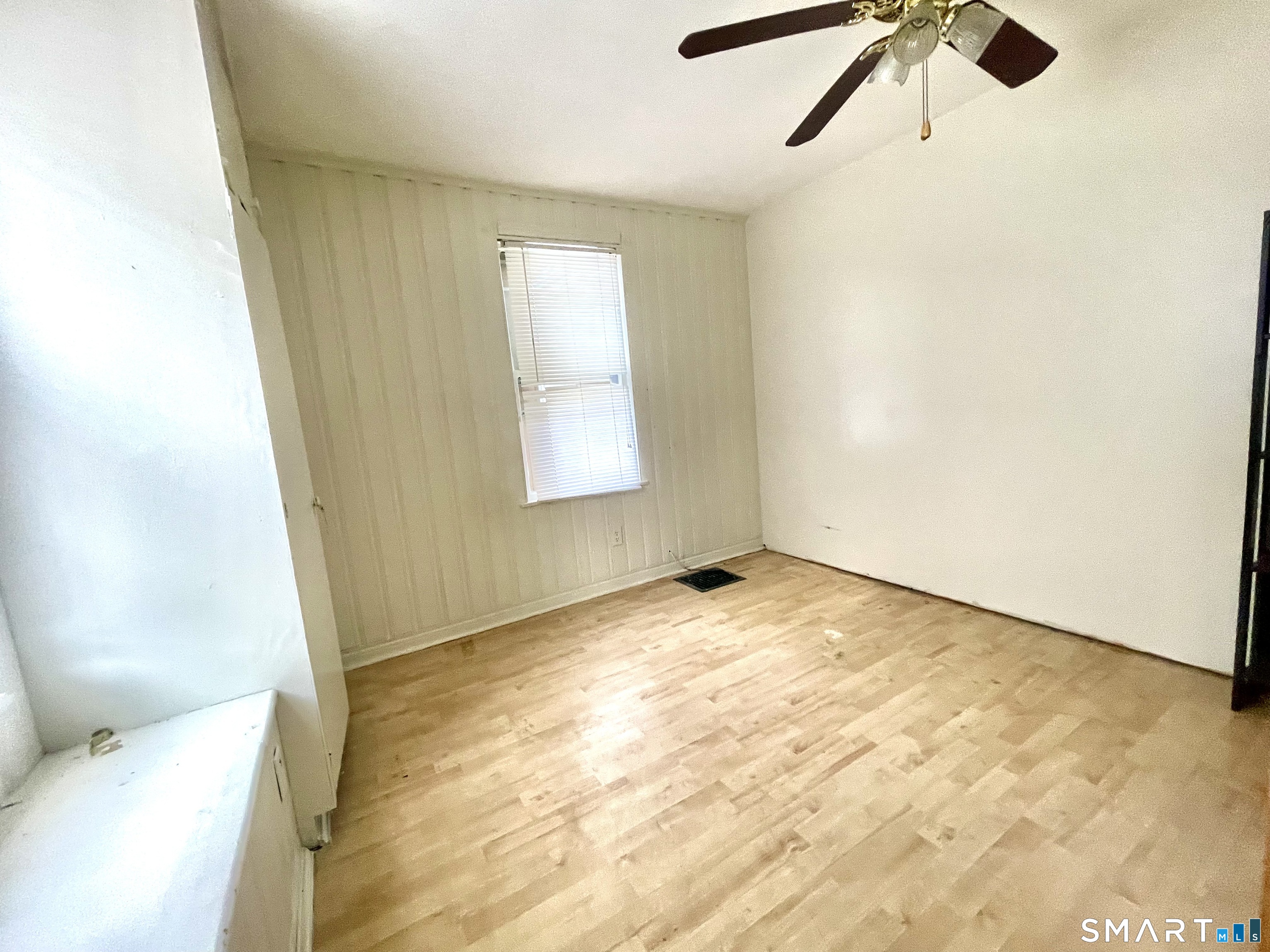 128 Franklin Street Waterbury, CT 06706 - Photo 13 of 25 a view of an empty room and window