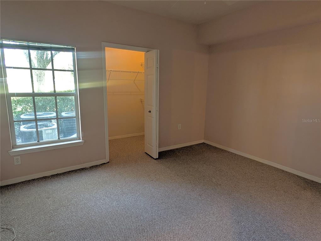 5122 Northridge Road, Unit 110 Sarasota, FL 34238 - Photo 13 of 23 an empty room with a window