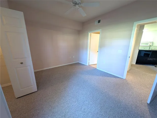 an empty room with a bathroom