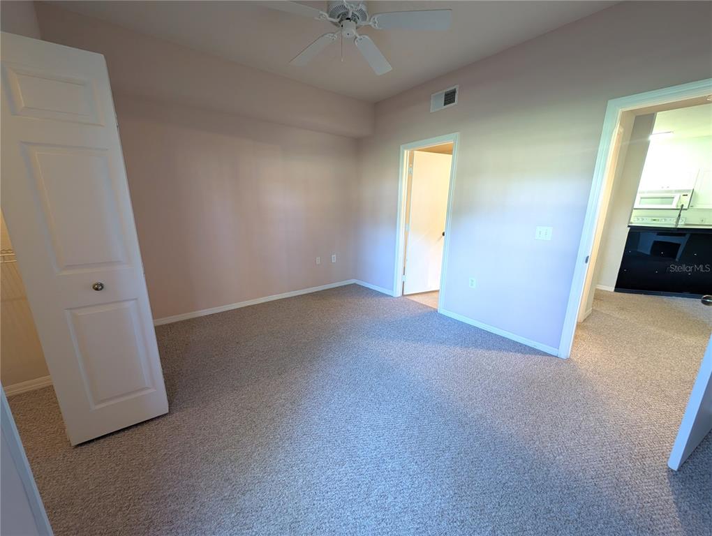 5122 Northridge Road, Unit 110 Sarasota, FL 34238 - Photo 15 of 23 an empty room with a bathroom