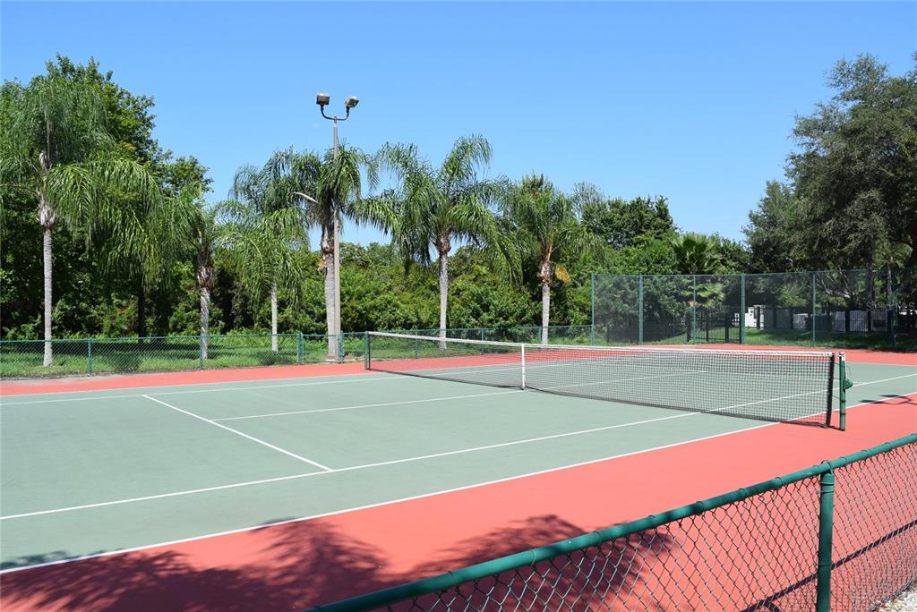 5122 Northridge Road, Unit 110 Sarasota, FL 34238 - Photo 20 of 23 a view of a tennis court
