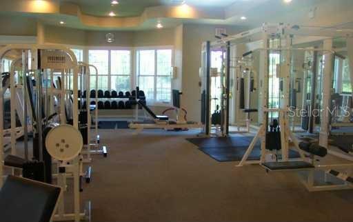 5122 Northridge Road, Unit 110 Sarasota, FL 34238 - Photo 21 of 23 a view of a room with gym equipment