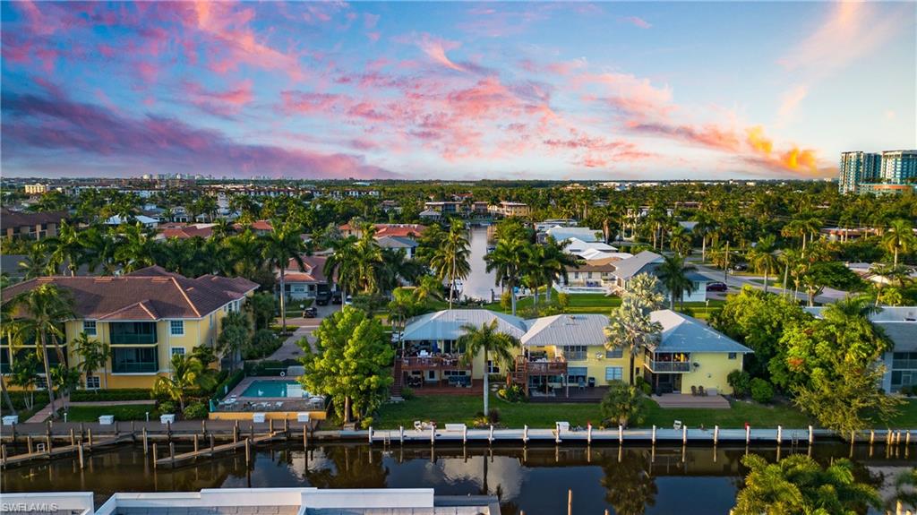 1560 Blue Point Avenue, Unit 3 Naples, FL 34102 - Photo 36 of 43 a view of a city with lots of houses