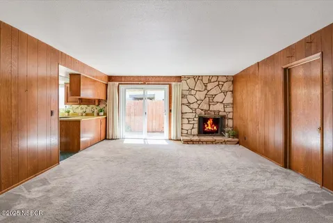 a view of a room with a garage