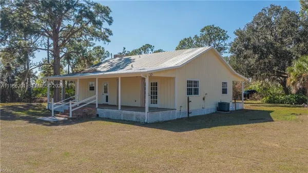front view of a house with a patio