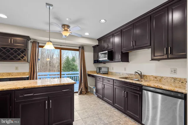 a kitchen with lots of counter space and a sink