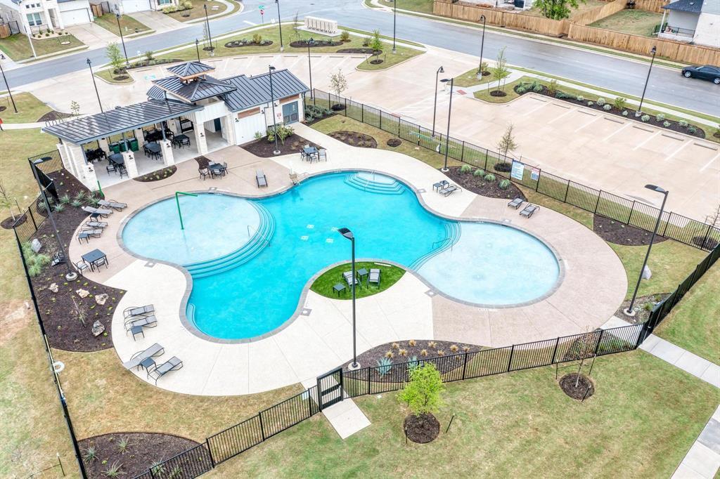 12212 Dillon Fls Drive Austin, TX 78747 - Photo 36 of 40 Community pool featuring a patio area